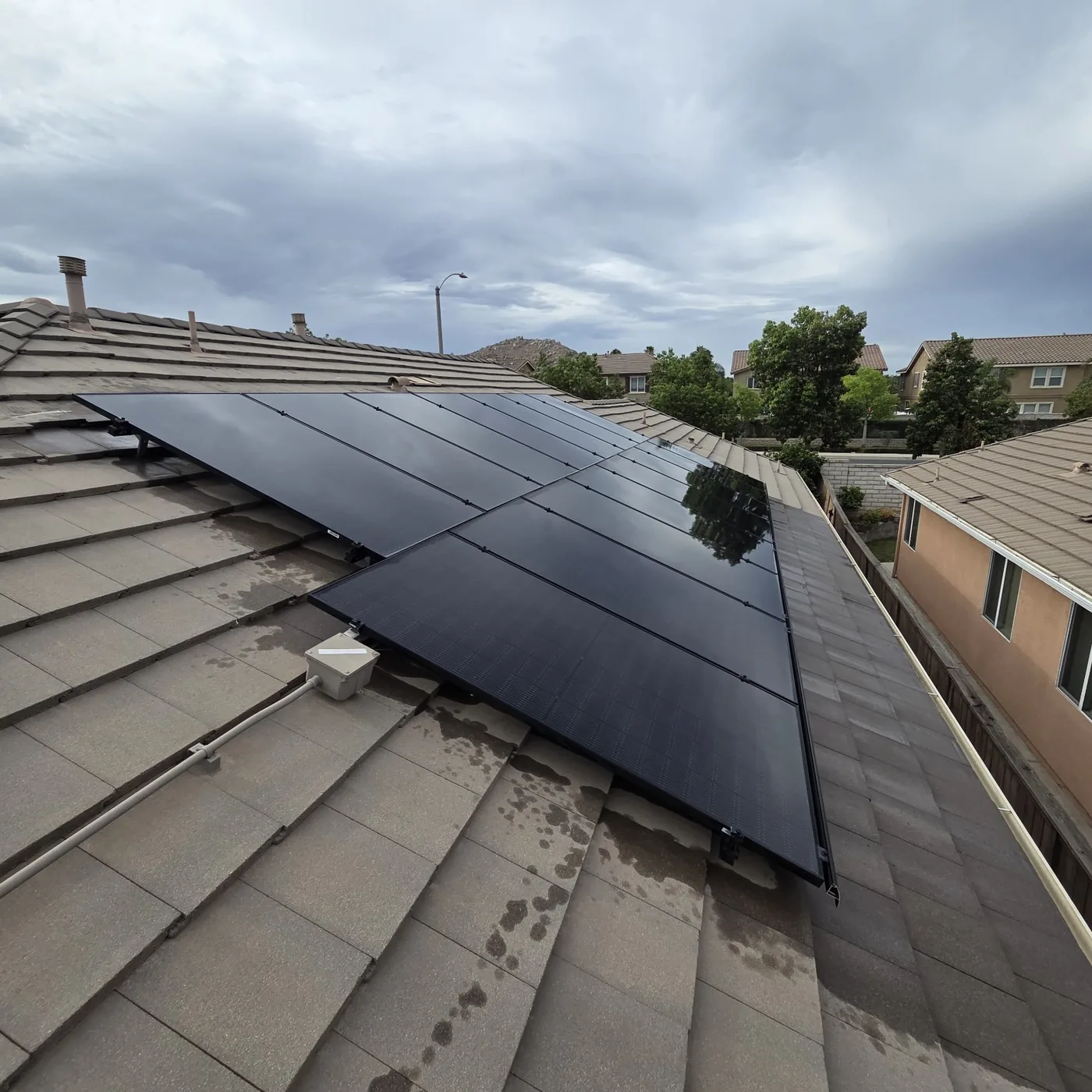 Dark clean solar panels after professional cleaning